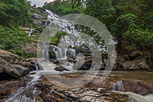 Mae Ya Waterfall in Rain Forest at Doi Inthanon National Park in Chiang Mai ,Thailand