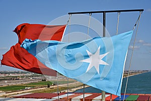 Maersk Line logo on the flag fluttering in the wind