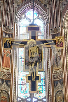Maestro Di FiglineÃ¢â¬â¢s painted wooden crucifix above the Main Altar in the Basilica di Santa Croce in Florence photo