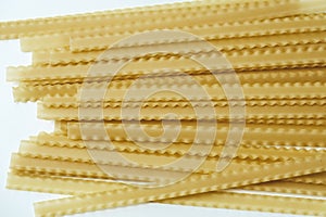 mafaldine pasta on a white background