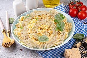 Mafaldine pasta with white creamy sauce