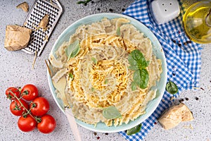 Mafaldine pasta with white creamy sauce