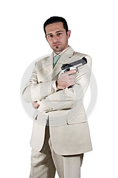 Mafia with arms crossed and a gunon hand photo