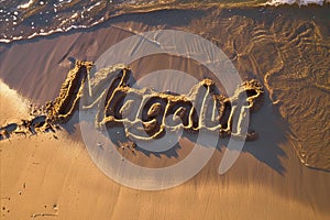 Magaluf, Spain written in the sand on a beach. Spanish tourism and vacation background photo