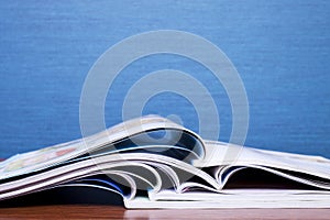 Magazines on a Blue Background