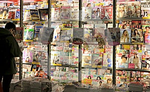 Magazines in press stand