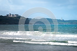 Magdalena Palace and Cabo Mayor lighthouse from El Puntal beach, Spain