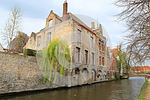 Mage with Rozenhoedkaai in Brugge, Dijver river canal photo