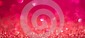 Magenta Christmas lights background, banner design. Shiny glowing surface with bokeh, abstract defocused glitter with