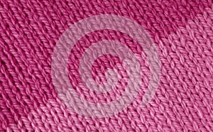 Magenta and pink stockinette knitting background