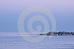 Magenta sunset over a quiet sea