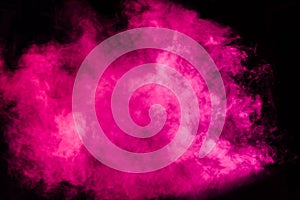 Magenta theatrical smoke on stage during a performance or show