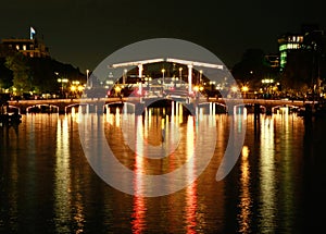 Magere bridge in Amsterdam at night