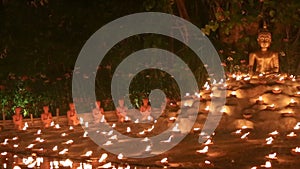 Magha puja day, Monks light the candle for buddha,