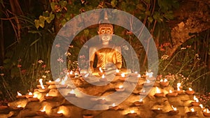 Magha puja day, Monks light the candle for buddha,