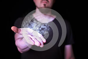 Magic ball in bearded wizard hand