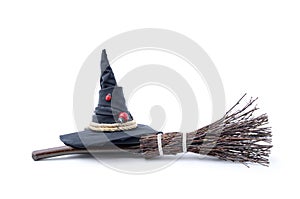 Magic Broom and Witch Hat on a White Background