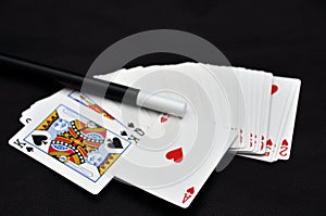 Playing cards and magic wand