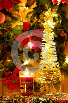 Magic Christmas candle and golden tree