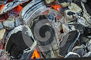 Magic close up view of smouldering coals.