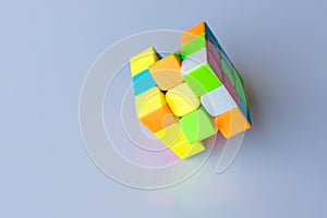 Magic cube or puzzle cube on a white isolated background