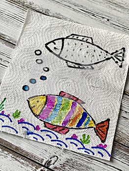 Magic, drawing fish, appears in the water, coloring book.