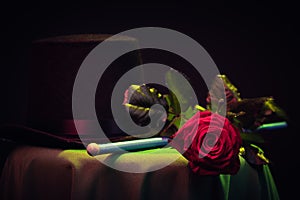 Magic, magician hat on table performance. prestidigitation background photo