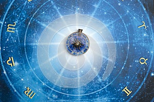 Magic pendant on blue horoscope like astrology, zodiac. esoteric topic