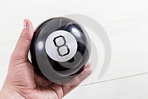 Magic prediction eight ball in hand