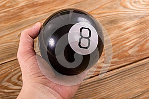 Magic prediction eight ball in hand