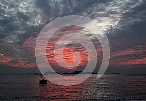 Magic sunset in river and boat