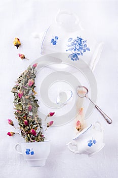 Magic tea party with roses herbal tea