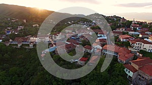 Magical aerial view of beautiful Sighnaghi town located on hills, golden hour