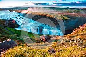 Magical charming bright colorful  landscape with a famous Gullfoss waterfall in the sunrise in Iceland. Exotic countries. Amazing