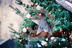 Magical Christmas market: Decoration with Christmas bauble on a fir branch