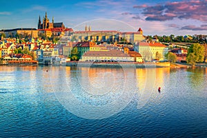 Magical colorful sunrise with historic buildings in Prague, Czech Republic