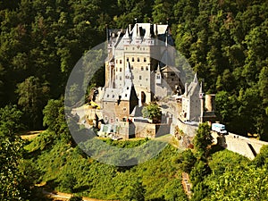 Magical: Eltz Castle With its unique location in the heart of the wild natural scenery of the Elzbach valley and its fascinating a photo