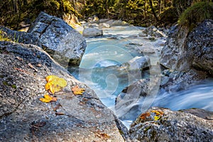 Magical Forest at Lake Hintersee with Creek Ramsauer Ache - HDR image. National Park Berchtesgadener Land, Germany