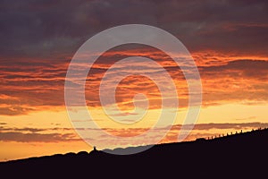 magical golden yellow and red sunset with clouds