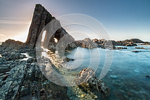 Magical monolith in Asturian beach photo