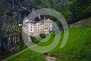 Magical Predjama Cave Castle on the cliffs in Slovenia