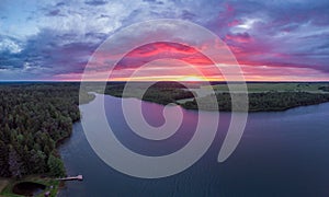 Magical purple sunset over lake in Belarus