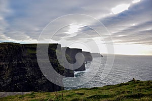 Magical sunrise on the shores of the Atlantic in Ireland near Cliffs of Moher