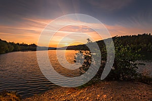 Magical sunset on the water reservoir Kretinka