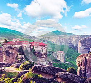 A magical view with the spire of the hill in the holy complex in the famous valley of the Meteora rocks with  Eastern Orthodox