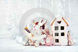 Magical winter christmas picture. Gingerbread house with snow.