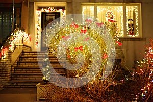 Magically decorated yard, staircase and house for the Christmas holidays