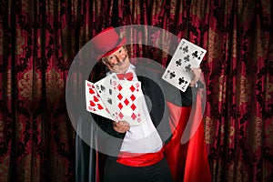 Magician with big cards