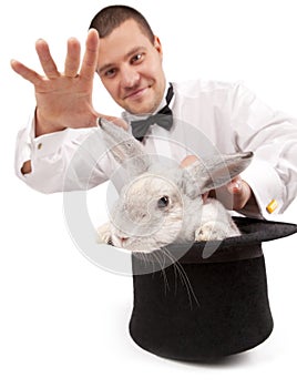 Magician conjuring with a rabbit