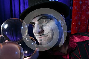 Magician with crystal balls